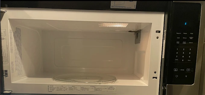 A spotless microwave interior after cleaning